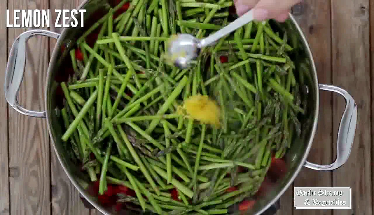 Lemon zest added to asparagus and peppers