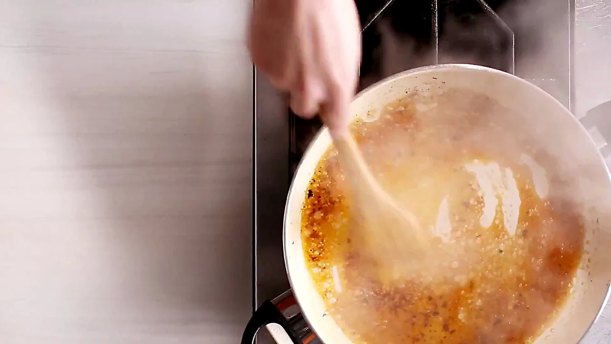 Lime pan sauce bubbling in the skillet