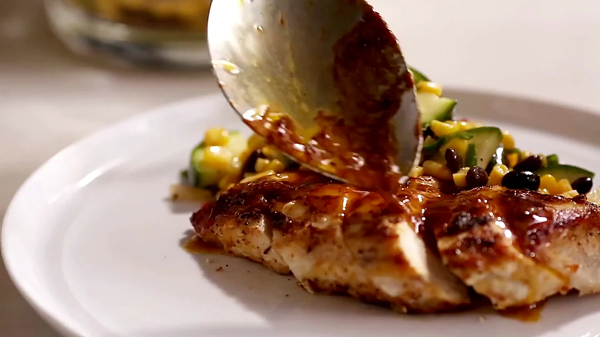 Lime pan sauce spooned over chicken