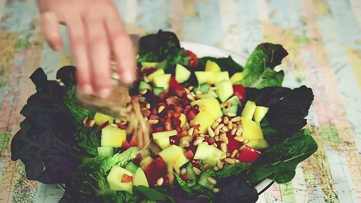 Crispy pancetta added to the salad