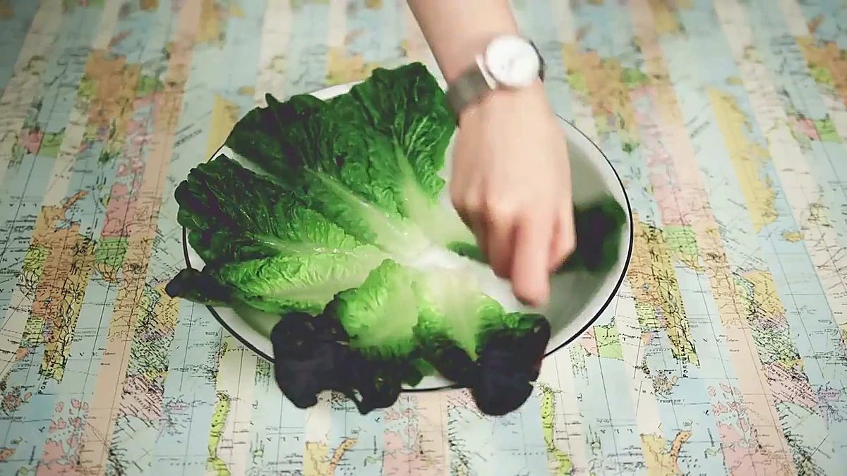 Lettuce leaves arranged on a serving plate