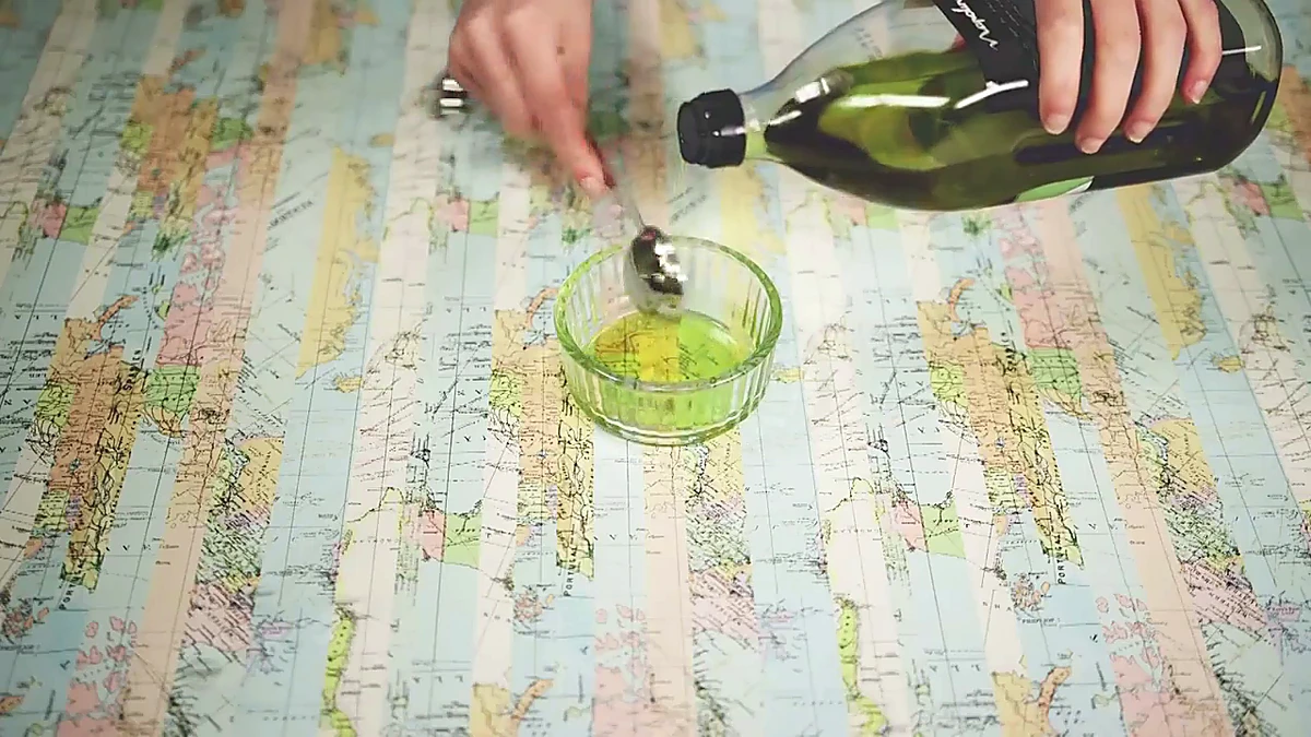 Olive oil measured for balsamic dressing