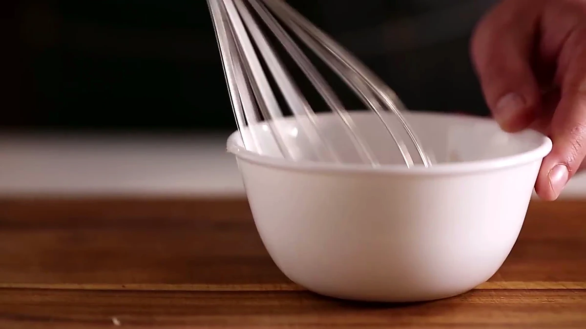 Asparagus sauce whisked in a bowl