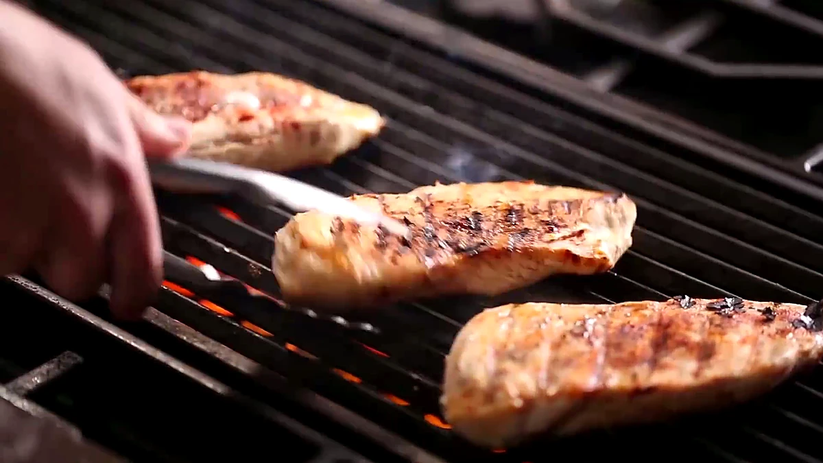 Chicken with grill marks after flipping