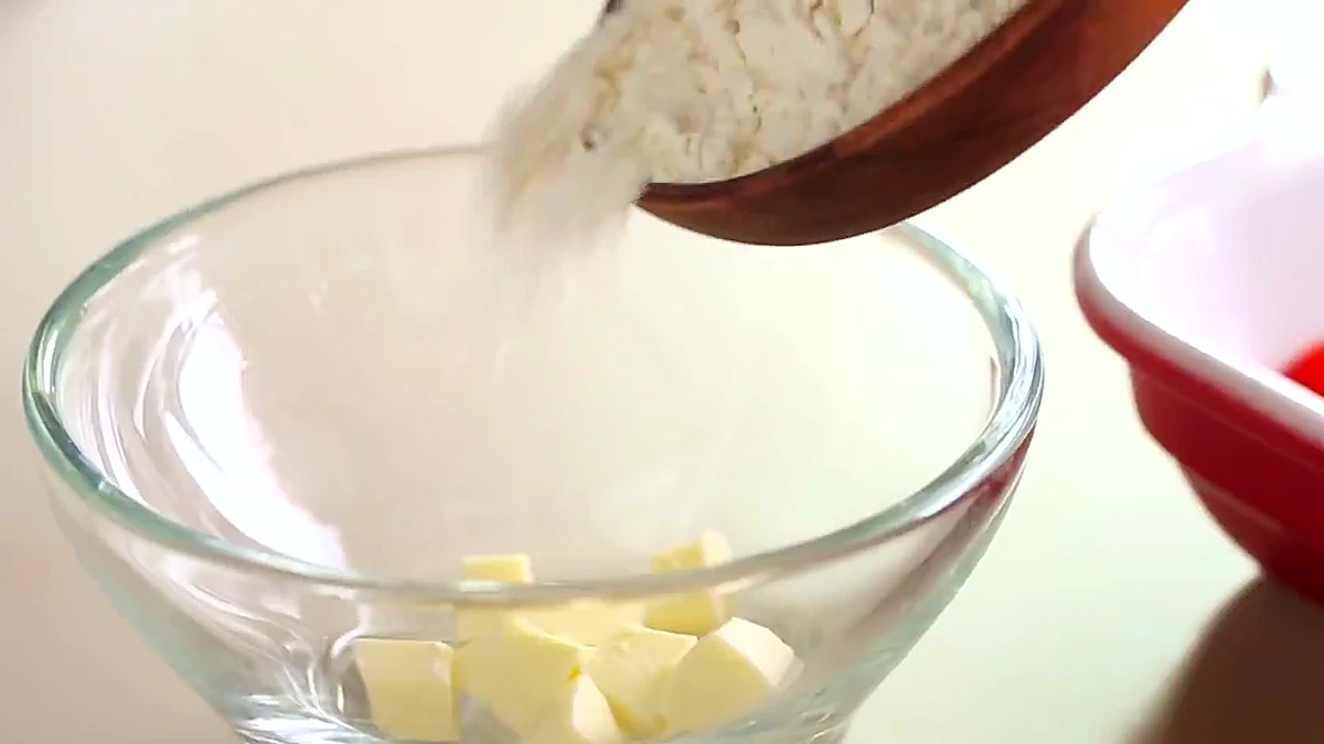 Flour added to small pieces of butter