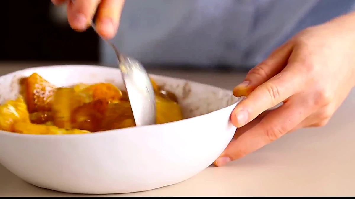 Orange slices tossed with allspice dressing