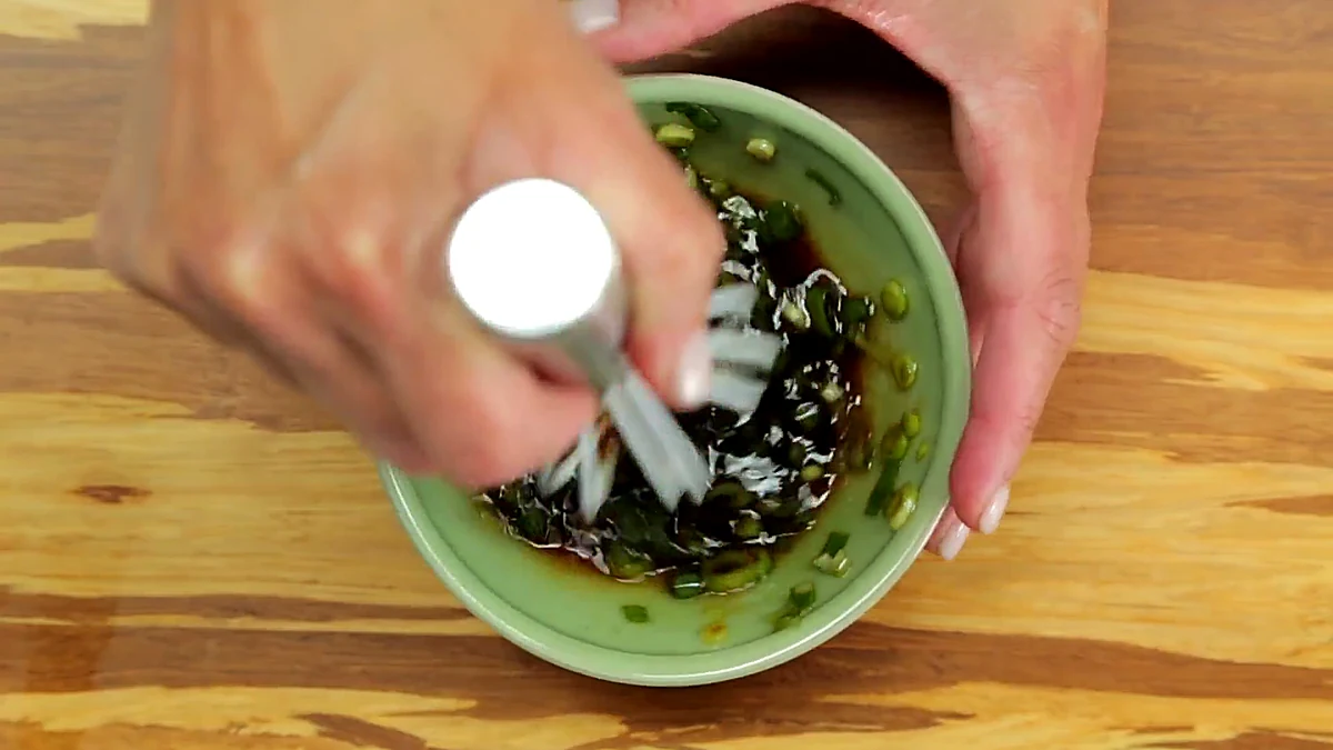Sesame soy dipping sauce mixed in a bowl