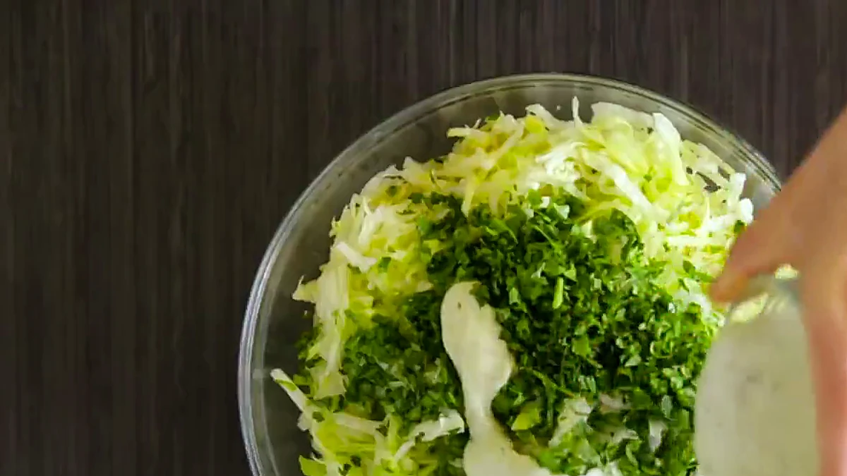 Shredded lettuce with cilantro avocado dressing