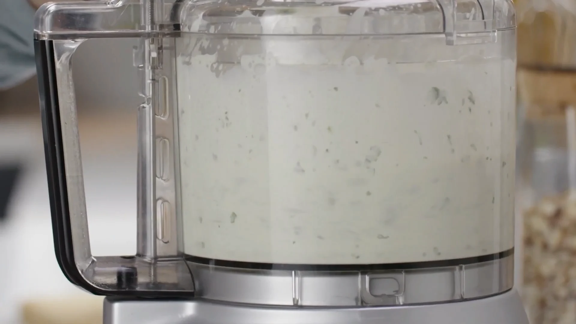 Pale green verde cream sauce blended in the processor