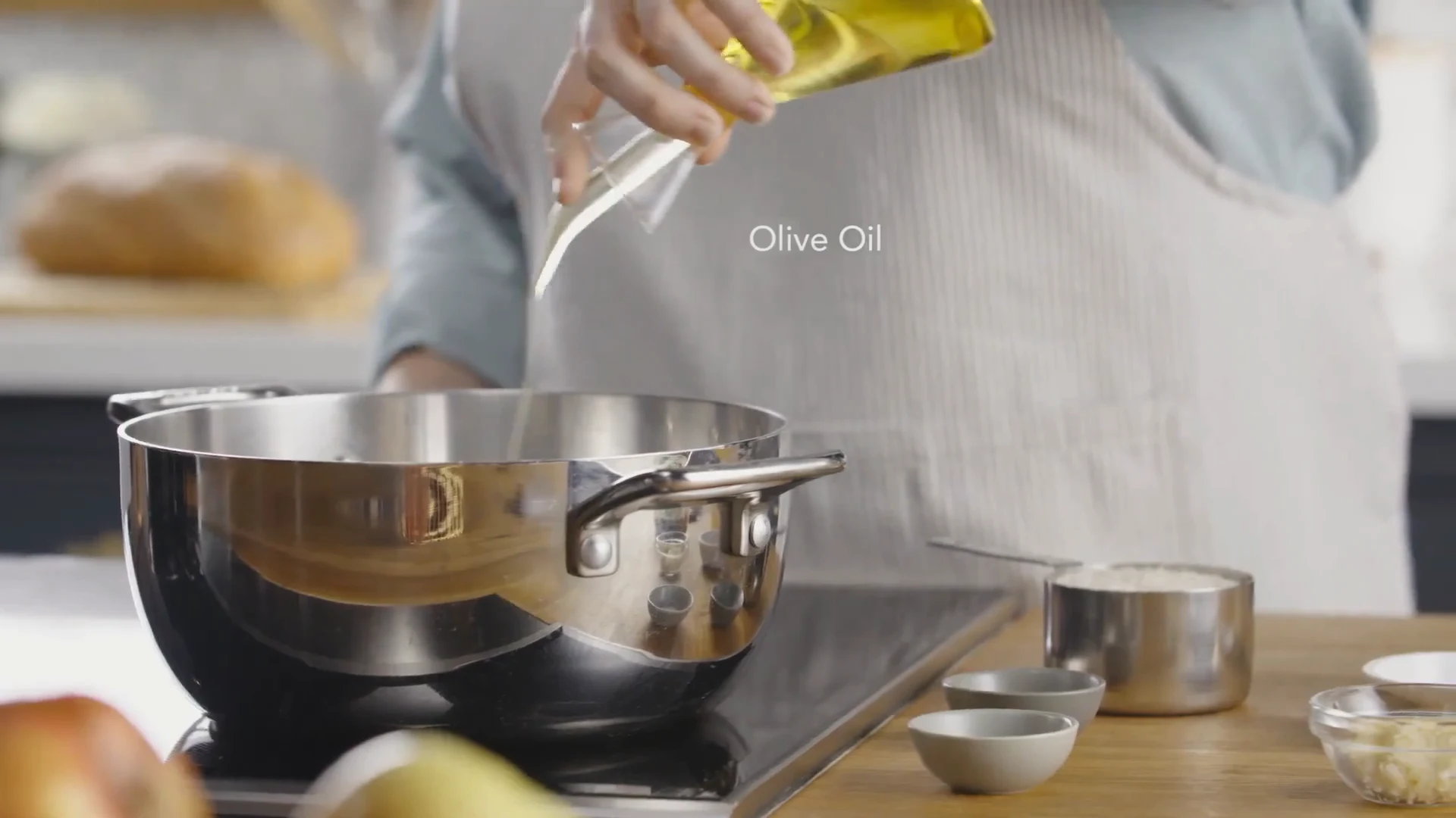 Olive oil poured into a deep pot