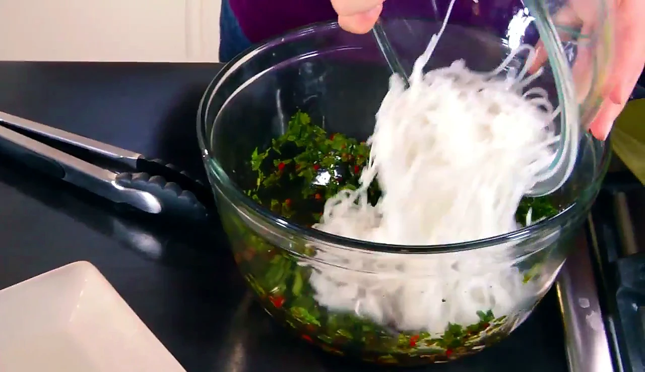 Bean thread noodles added to the sauce bowl