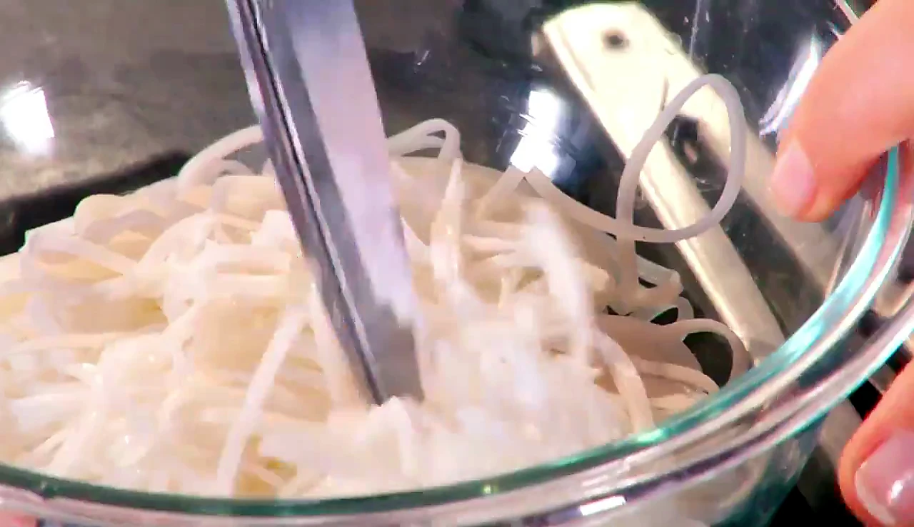 Bean thread noodles cut with kitchen scissors