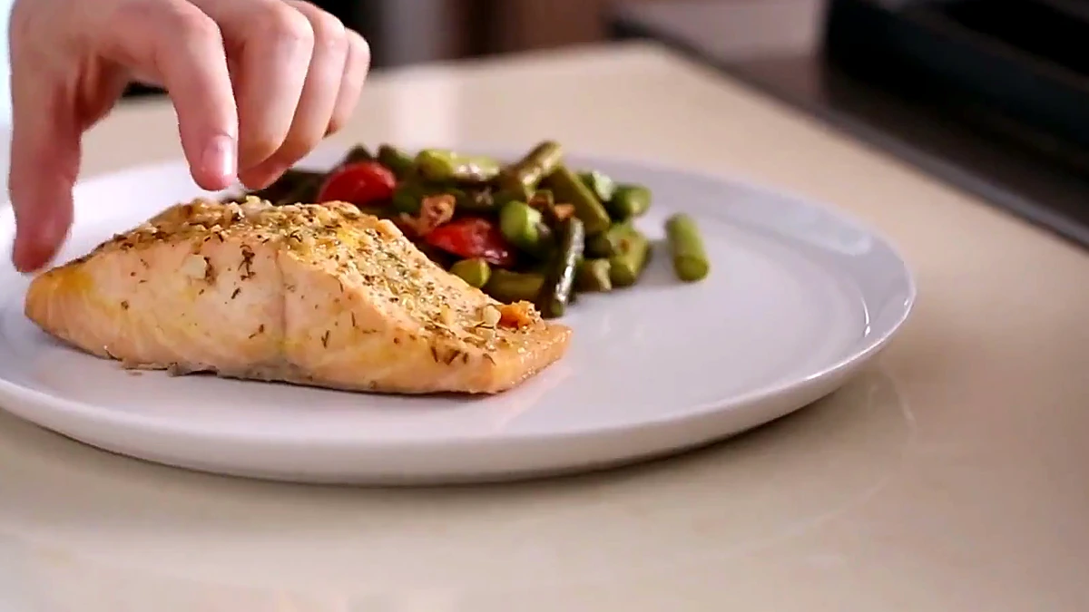 Salmon plated with asparagus almond salad