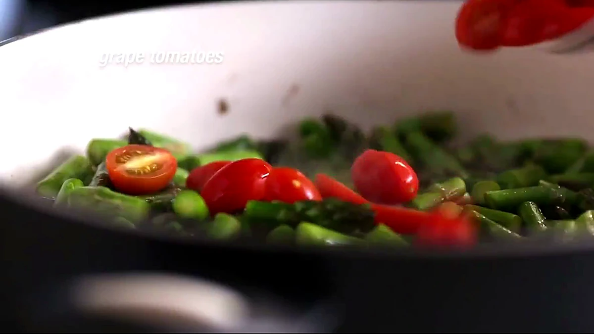 Grape tomatoes added to asparagus