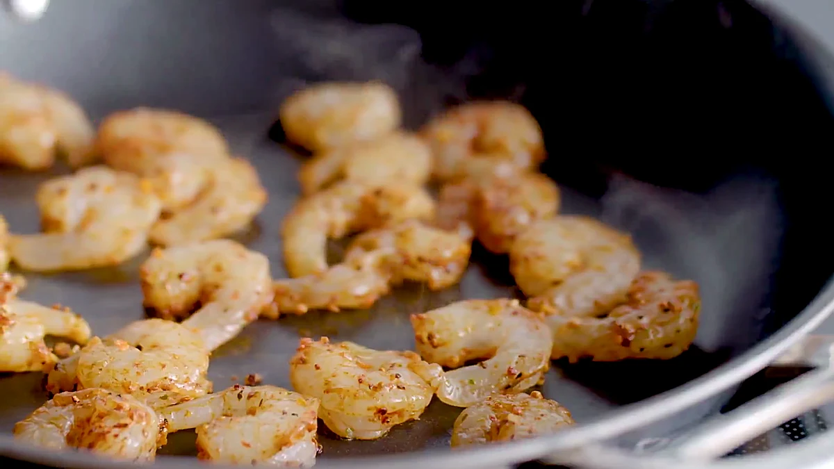 Chipotle shrimp cooking in a skillet