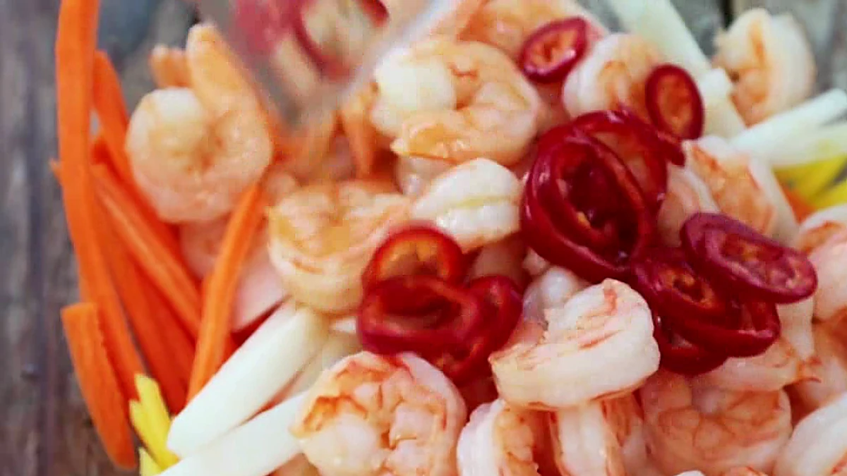 Shrimp mango lettuce wrap filling tossed