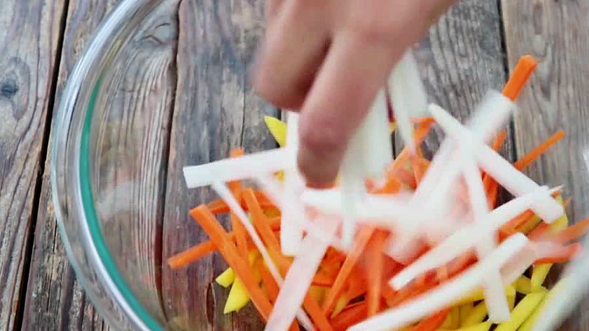 Mango carrot and daikon in a glass bowl