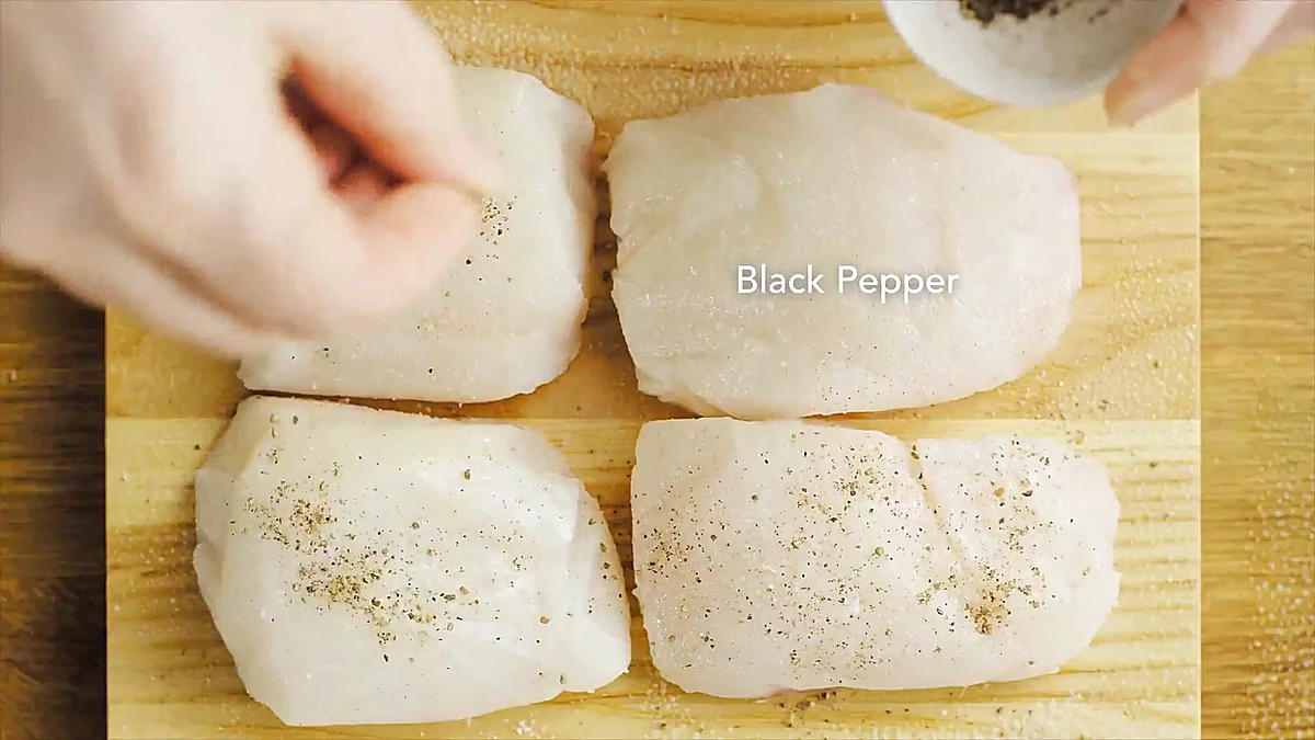 Black pepper added to the fish fillets