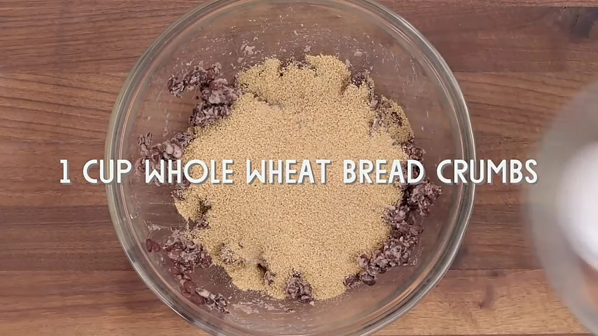 Whole wheat breadcrumbs added to black bean mixture