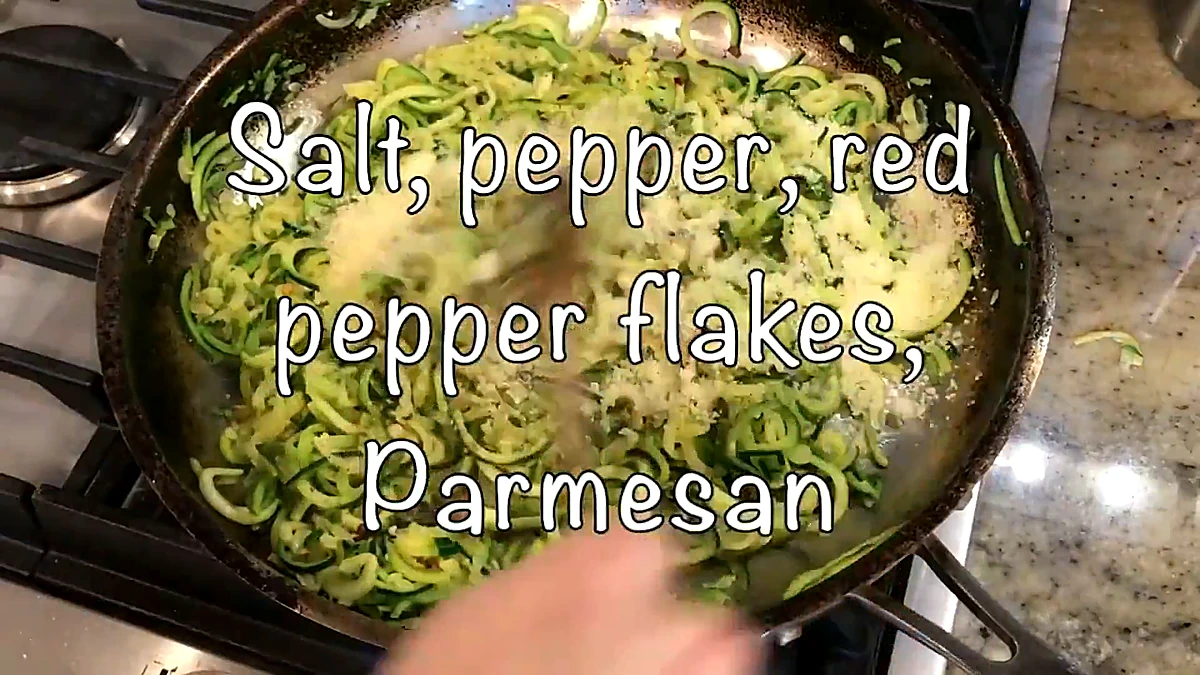 Parmesan added to zucchini noodles