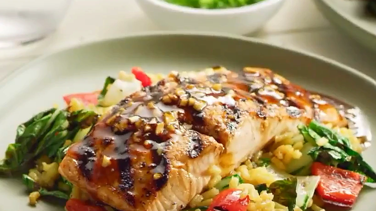 Close look at the grilled citrus balsamic salmon over the rice salad