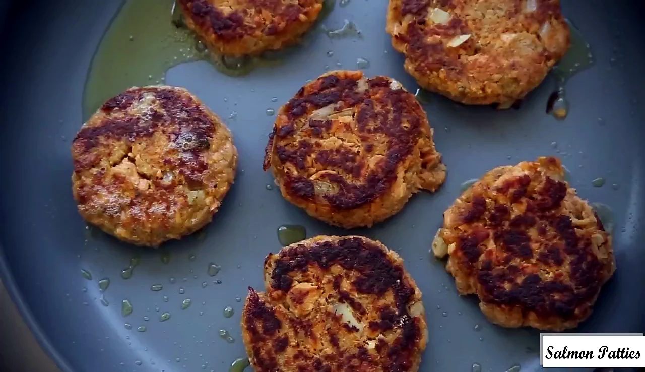 Browned salmon patties in the skillet