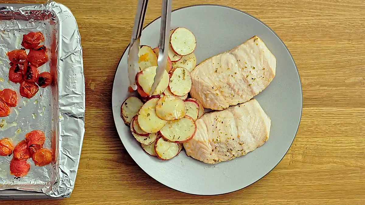 Baked salmon and roasted potatoes plated together