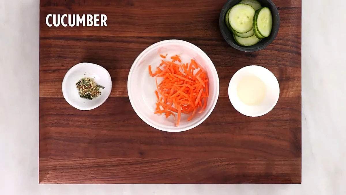 Carrots cucumber rice vinegar and furikake for sushi sliders