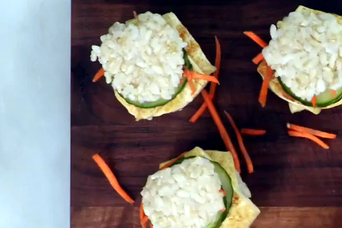 Sushi sliders being assembled on a board