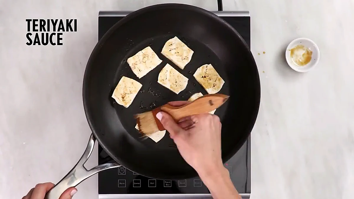 Teriyaki sauce brushed over tofu