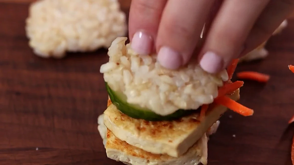 Top rice bun added to sushi slider