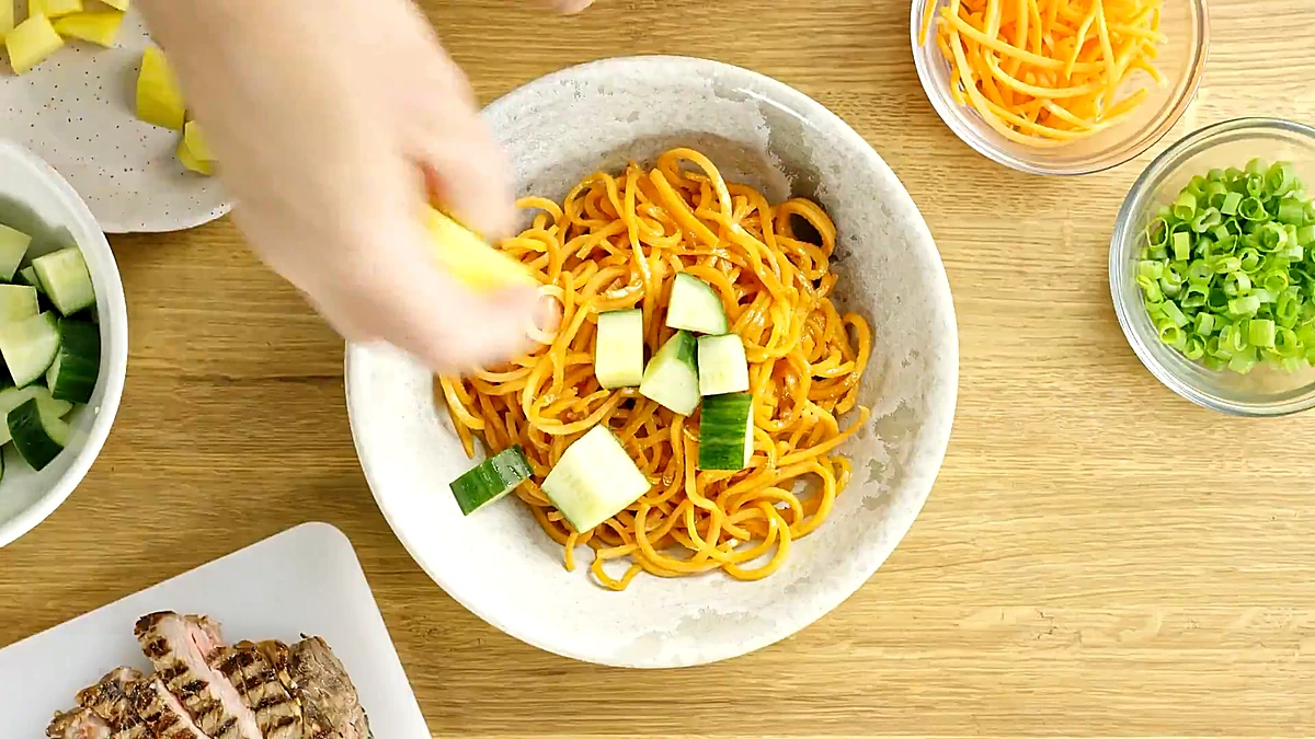 Cucumber and mango added to sweet potato spirals