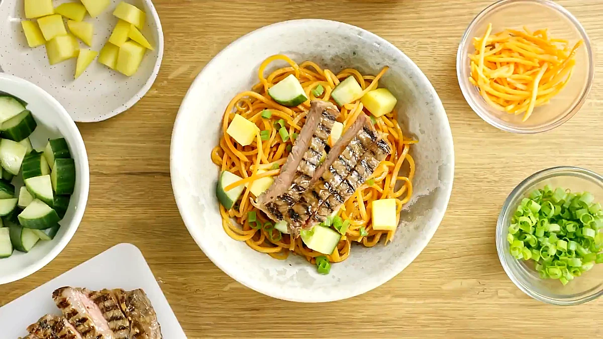Teriyaki steak added to sweet potato spiral bowl