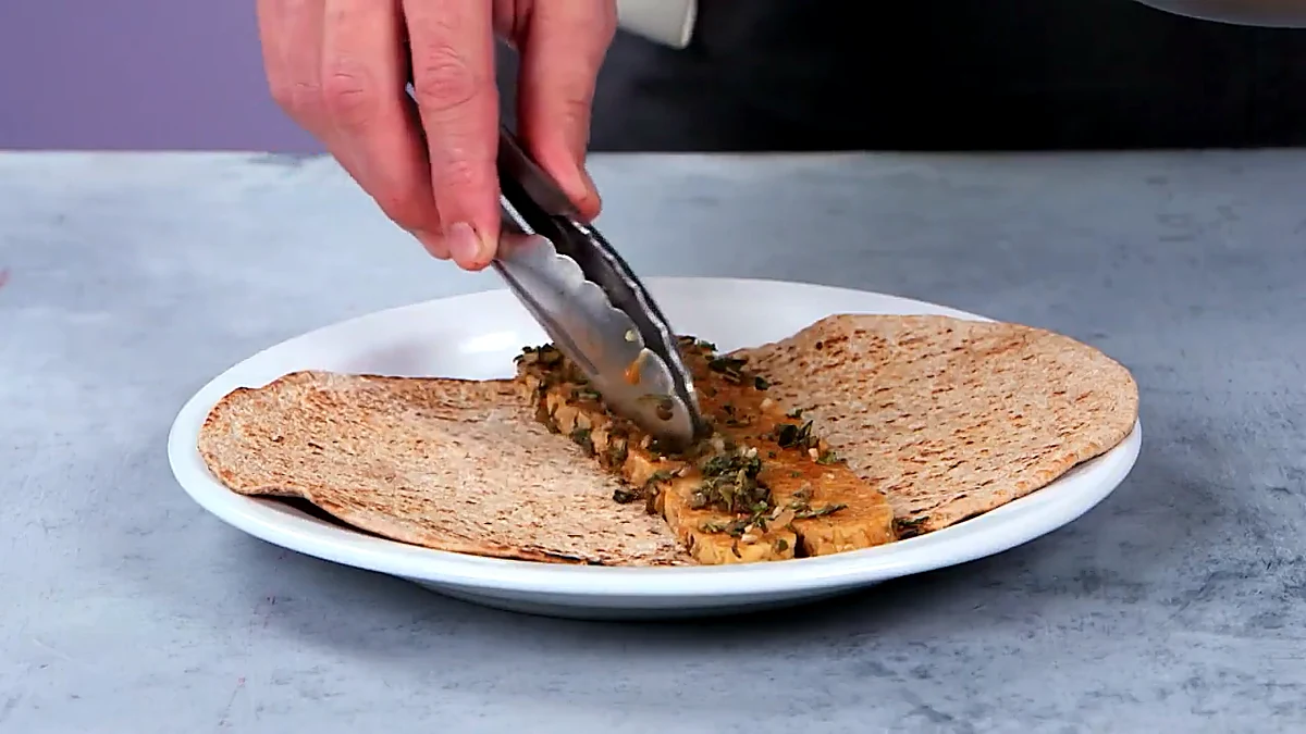 Braised tempeh added to flatbread