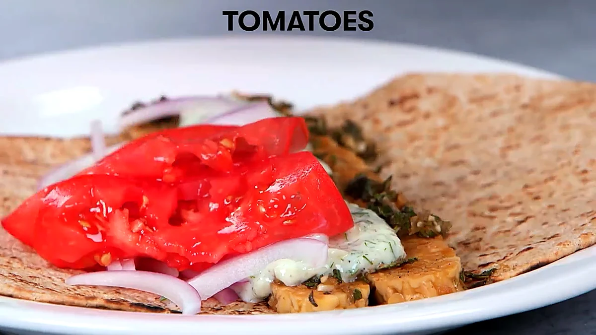 Tomatoes added to tempeh gyro