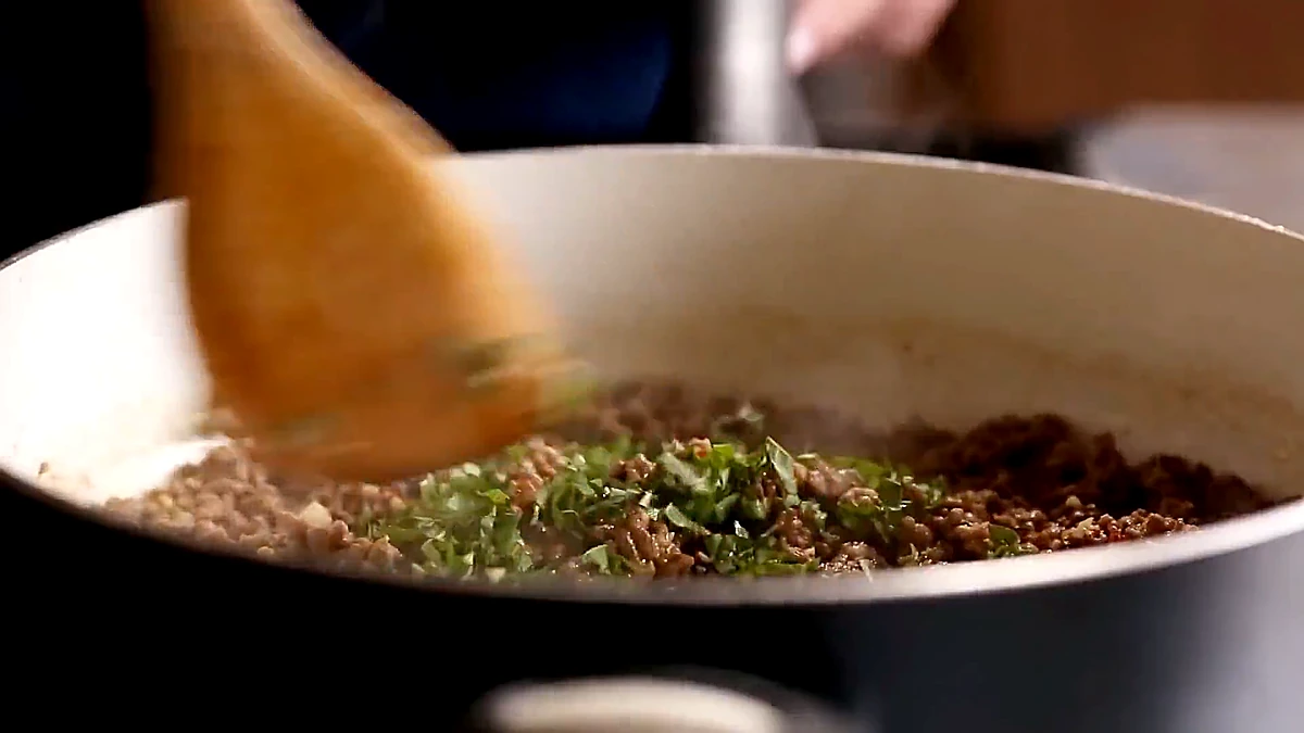 Fresh basil stirred into the beef