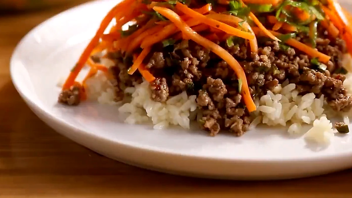 Close view of Thai beef with carrot basil salad