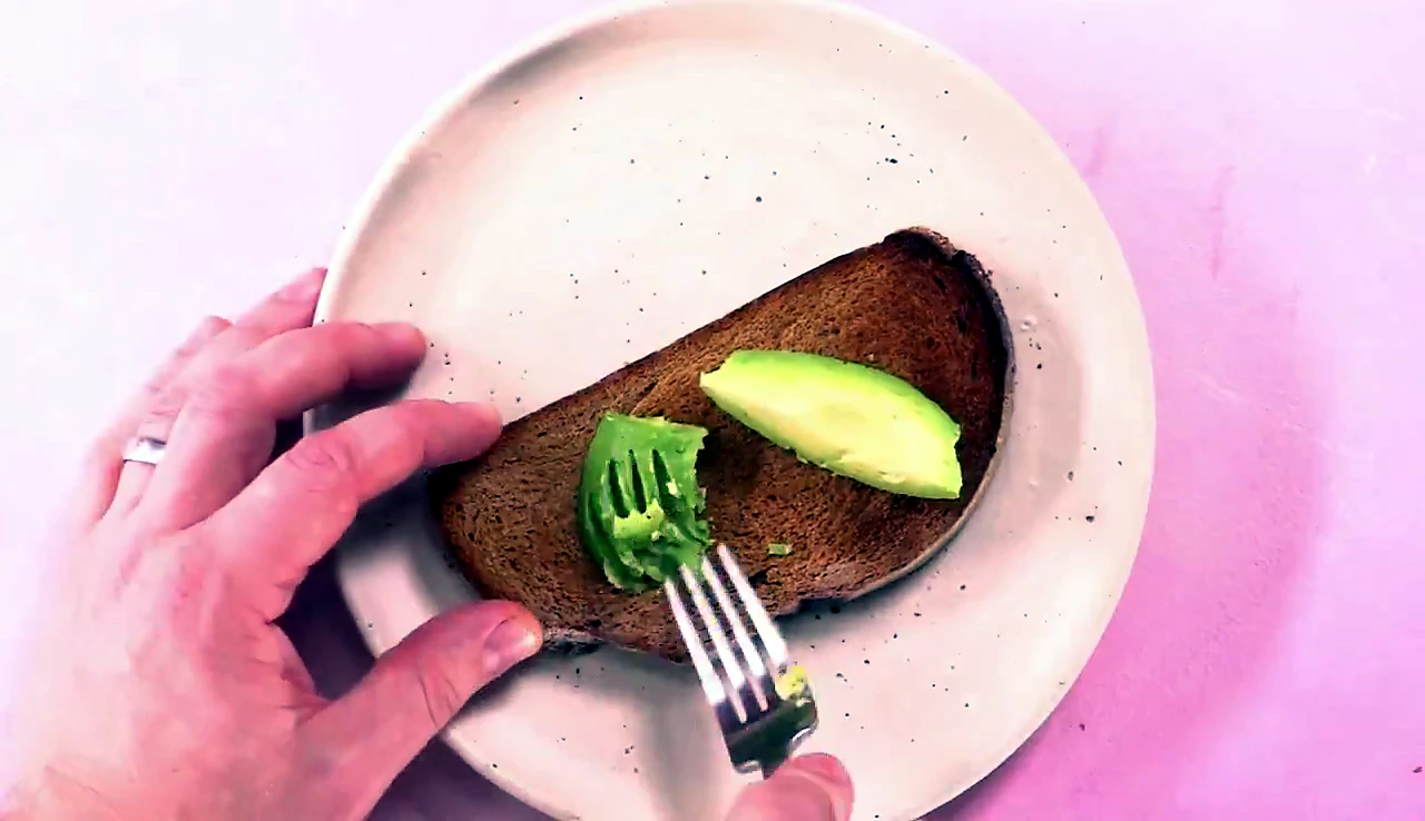 Avocado slices placed on toast