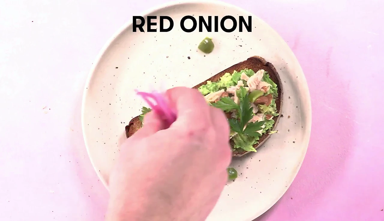Pickled red onions added over tuna
