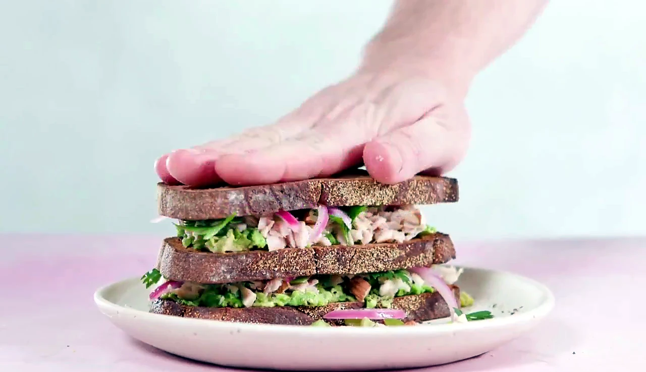 Tuna avocado sandwich pressed gently