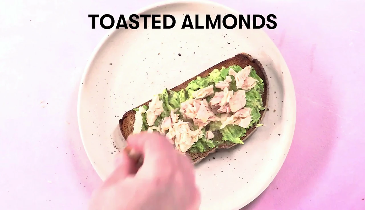 Toasted almonds added to tuna avocado toast