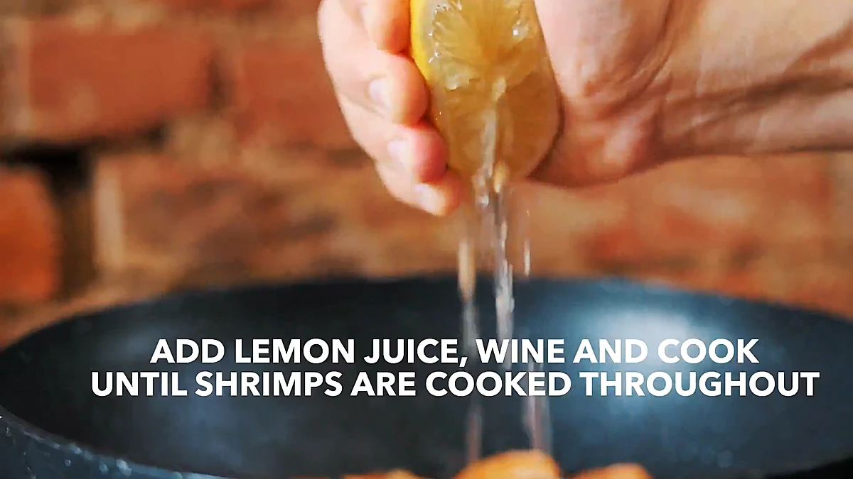 Lemon juice squeezed into the shrimp