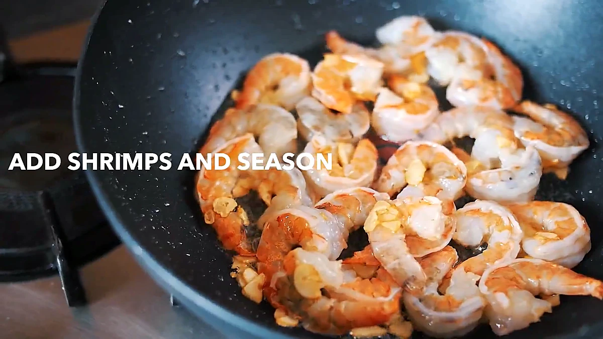 Shrimp seasoned and cooking in the pan
